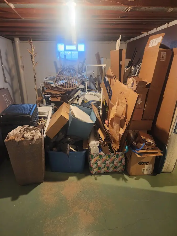 Roll-off dumpster container at job site for 6 Yard Dumpster Rental in Hubbardston